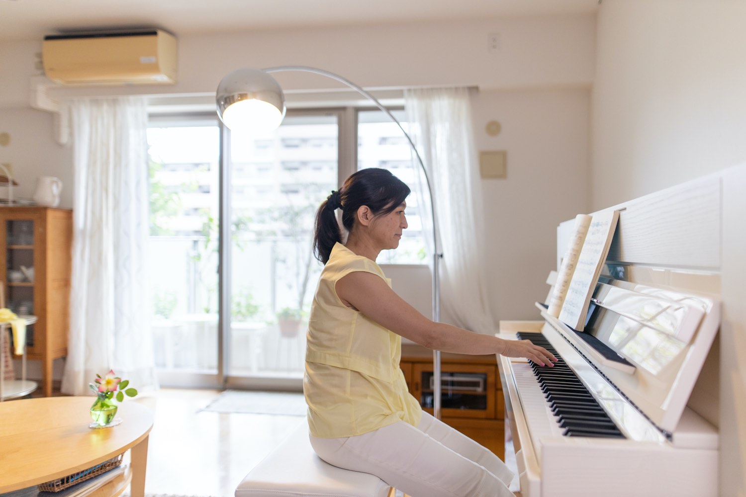 iStock-Satoshi-K-playing-piano-in-japan-apartment.jpg